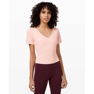 (4) $68 Lululemon Nulu Cropped Slim Yoga Short Sleeve Pink Mist